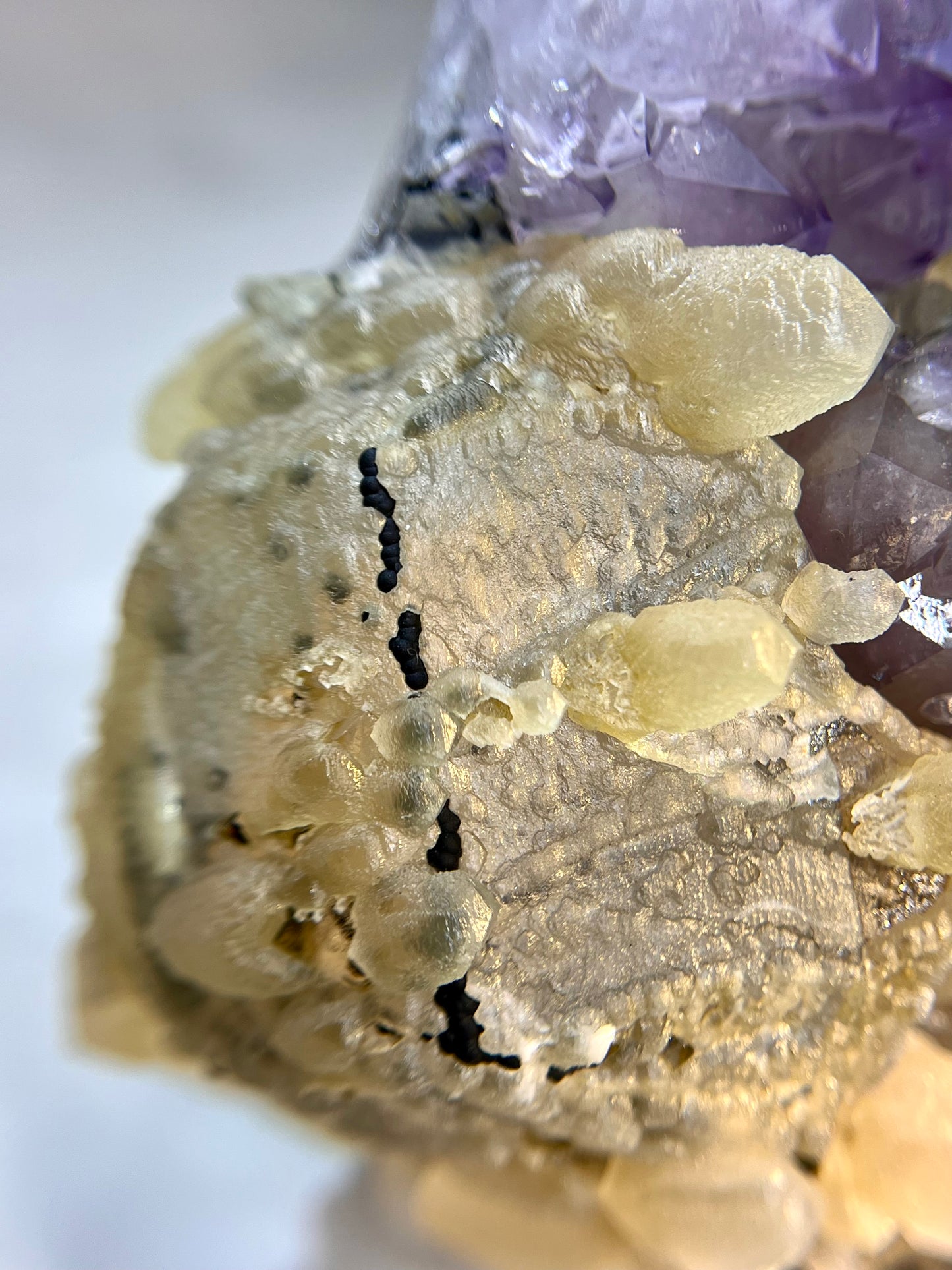 Amethyst With Complex Calcite x Goethite Cutbase