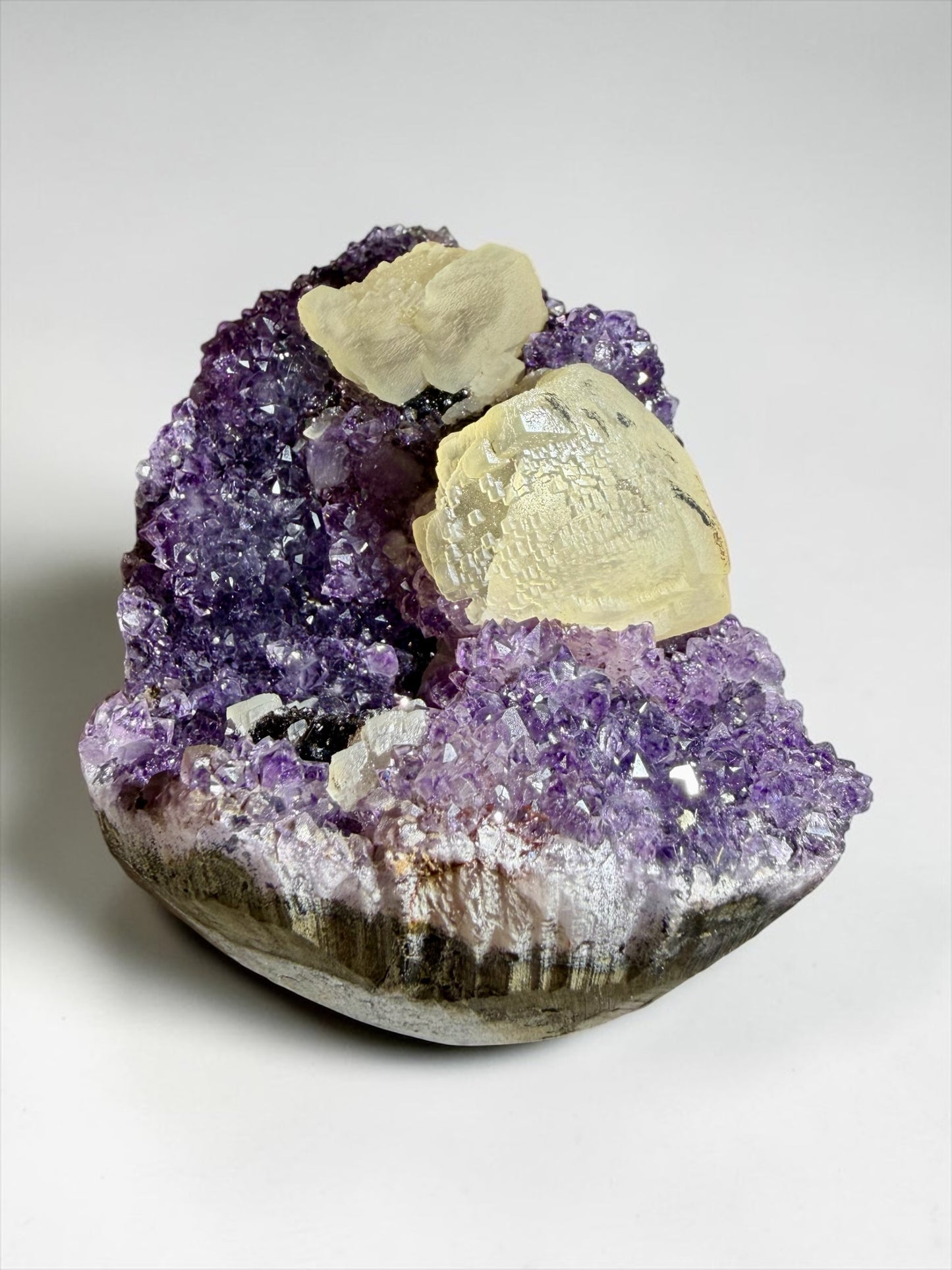 Pixel-Formation Calcite on Amethyst with Goethite- Uruguay | River Walkers Minerals