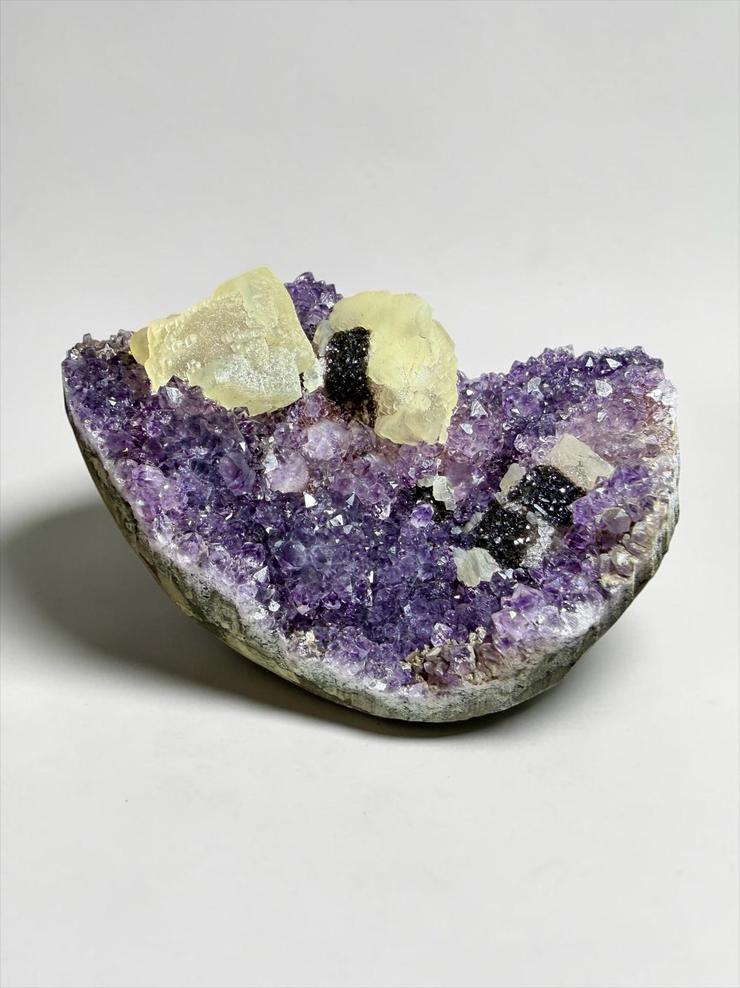 Pixel-Formation Calcite on Amethyst with Goethite- Uruguay | River Walkers Minerals